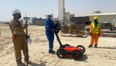 Three GPR Engineers working on site in Qatar
